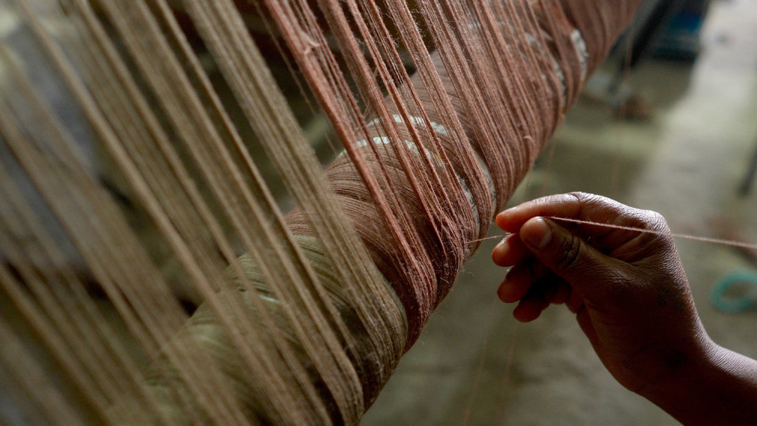 A loom is dressed slowly and only once a season